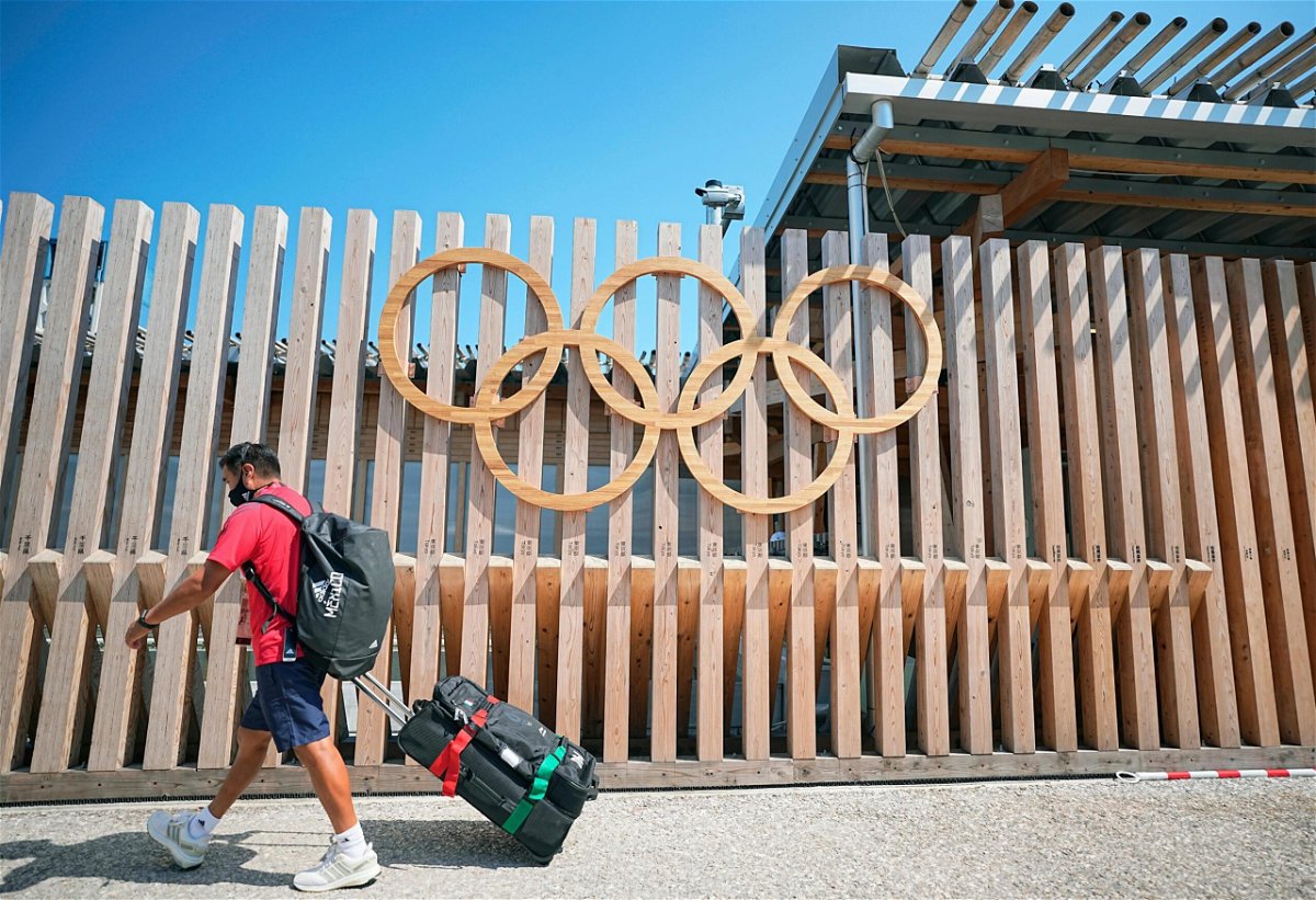 <i>Michael Kappeler/picture-alliance/dpa/AP</i><br/>The entrance to the Olympic Village is shown at Tokyo 2020. A Tokyo public health expert says the Olympic bubble system 