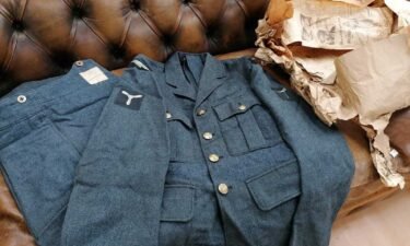 A British World War II Royal Air Force (RAF) pilot's uniform was found wrapped in newspapers dating back to November 1951.