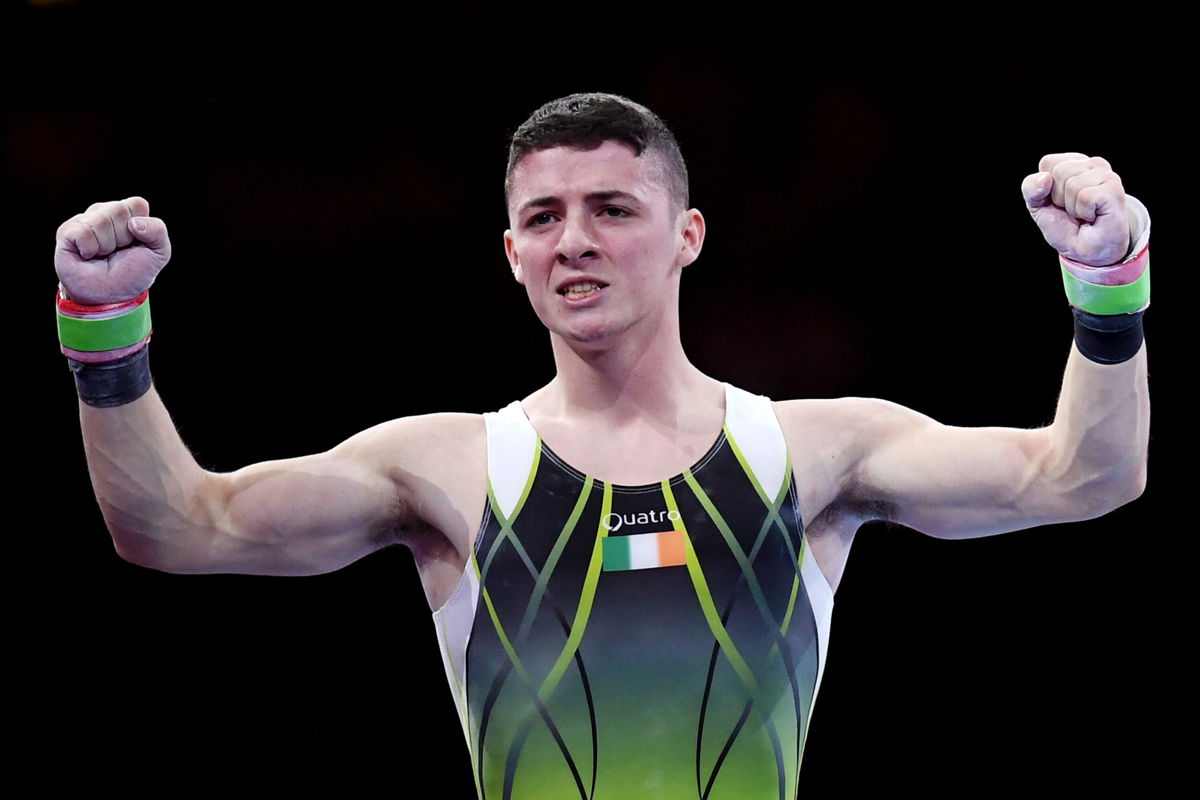 <i>Laurence Griffiths/Getty Images Europe/Getty Images</i><br/>Rhys McClenaghan celebrates during the FIG Artistic Gymnastics World Championships on October 12