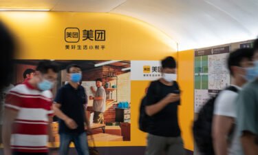 A Meituan ad inside a subway station is pictured in Beijing in July. Chinese tech stocks keep getting slammed with a massive sell-off that has wiped out hundreds of billions of dollars in market value as investors continue to digest Beijing's widening crackdown on private enterprise.