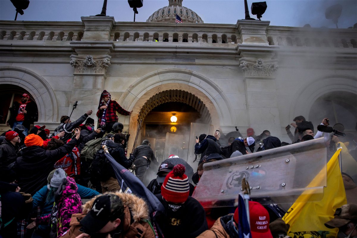 <i>Brent Stirton/Getty Images</i><br/>Trump supporters clash with police and security forces as people try to storm the US Capitol on January 6 in Washington