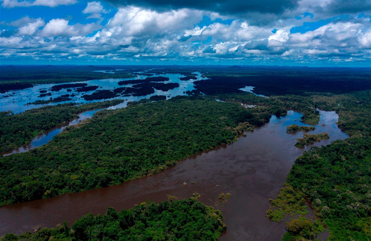 <i>MAURO PIMENTEL/AFP/AFP via Getty Images</i><br/>The Iriri River in the Amazonian rainforest is pictured in Brazil in 2019.