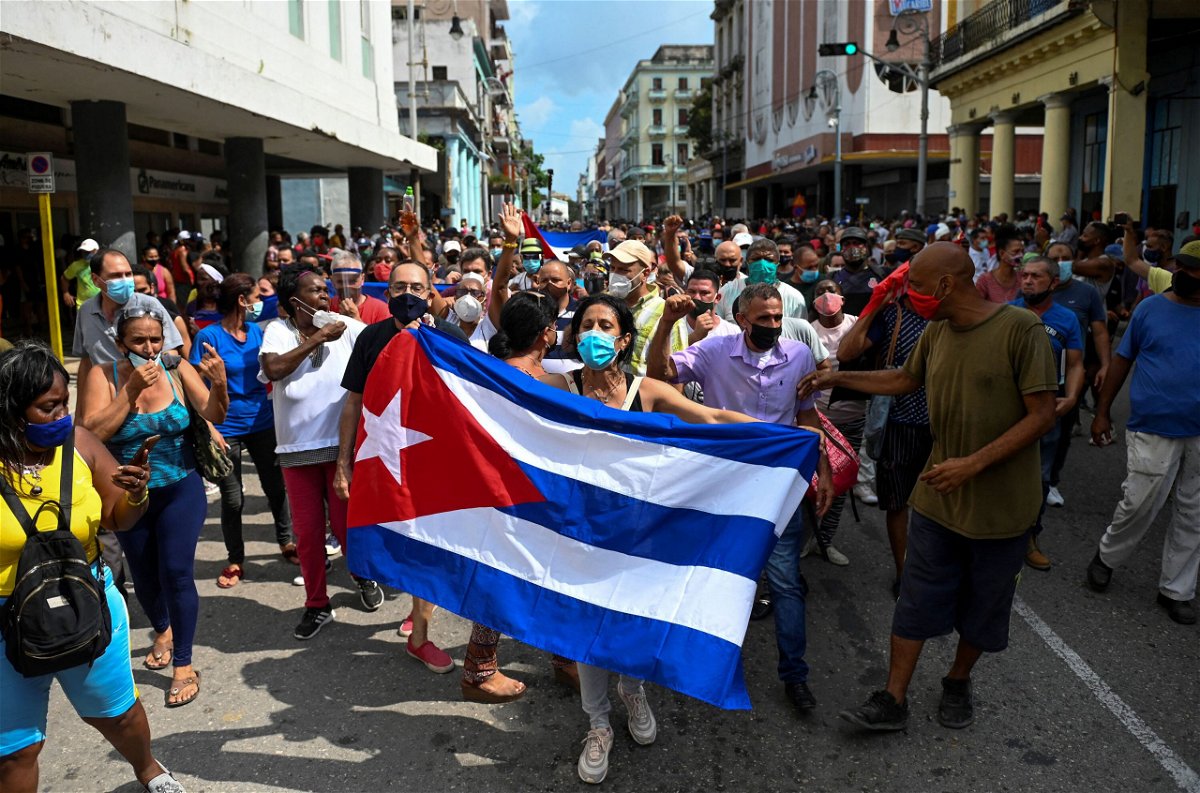 <i>Yamil Lage/AFP/Getty Images</i><br/>People take part in a demonstration to support the government of the Cuban President Miguel Diaz-Canel in Havana