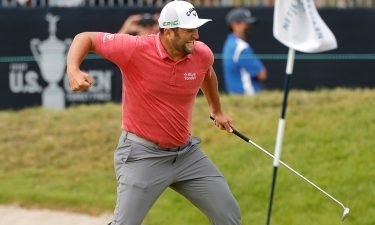 Jon Rahm celebrates his birdie on the 18th during the final round of the US Open.