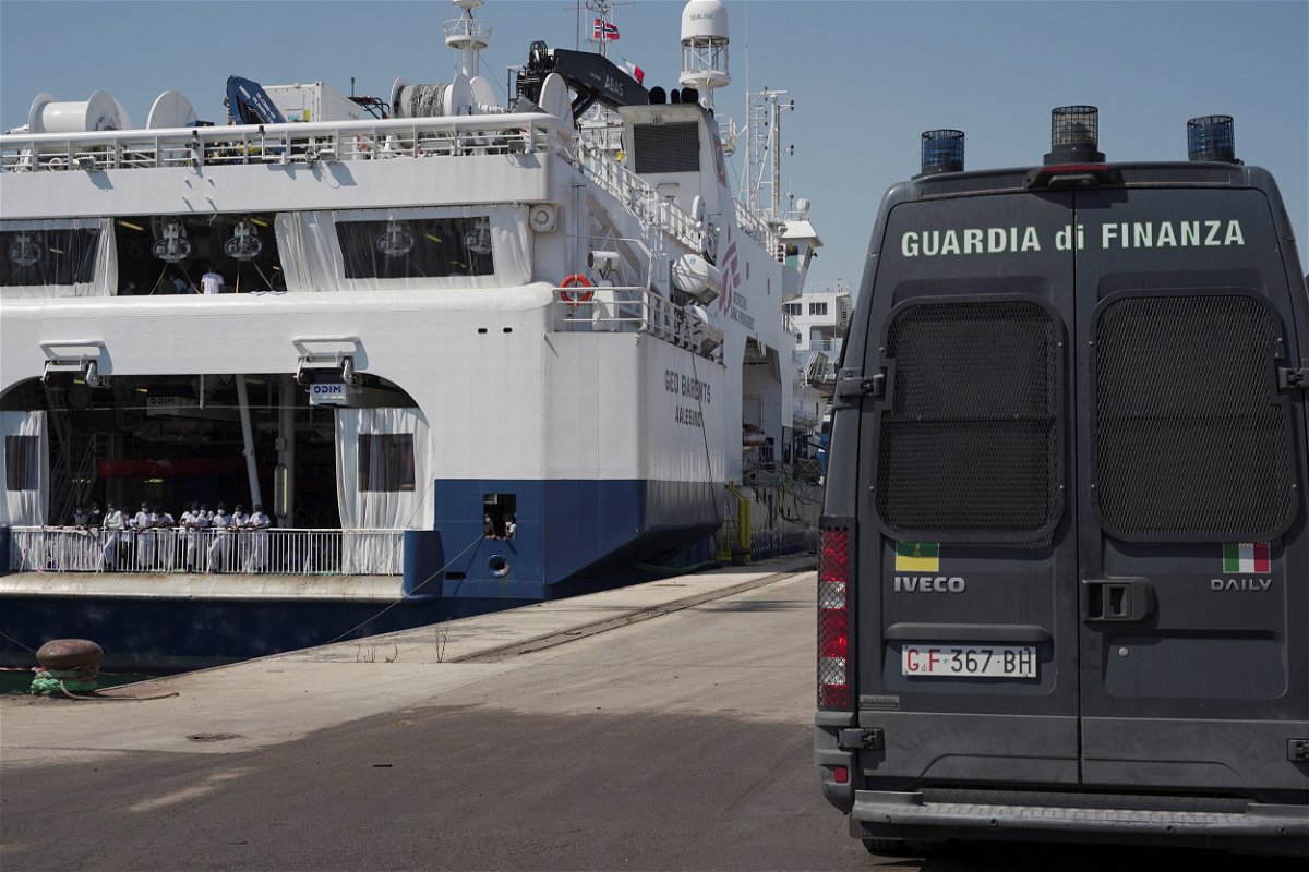 <i>Antonio Parrinello/Reuters</i><br/>An Italian law enforcement vehicle parked next to the ship 
