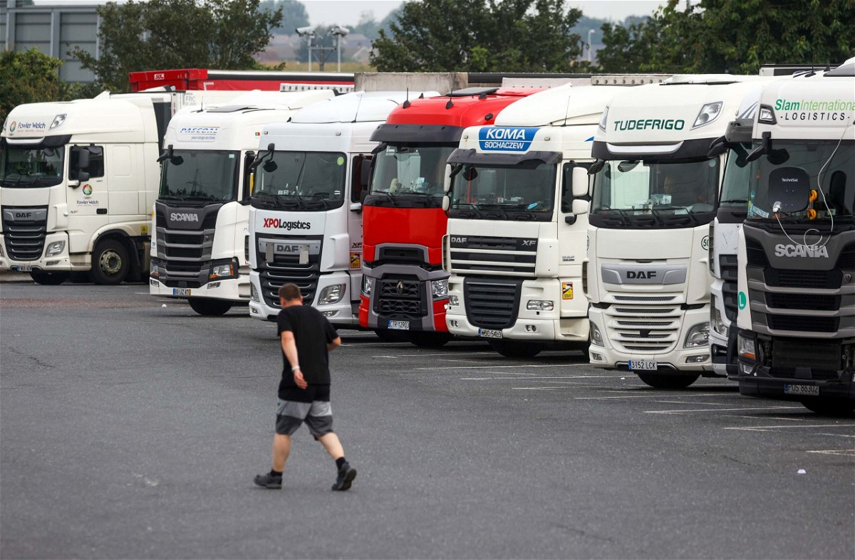 <i>Chris Ratcliffe/Bloomberg/Getty Images</i><br/>Heavy goods vehicles at a truck stop near Chafford Hundred