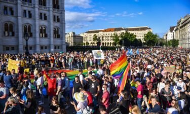 Participants gather in Budapest on June 14 during a demonstration against the Hungarian government's draft bill seeking to ban the "promotion" of homosexuality in schools. Hungary's right-wing populist Prime Minister Viktor Orbán has proposed a referendum on the country's controversial new LGBTQ law.