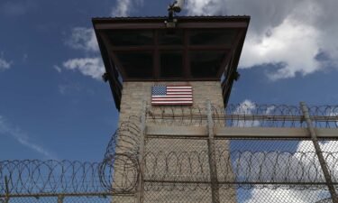 A guard tower stands at the entrance of the US prison at Guantanamo Bay on October 23
