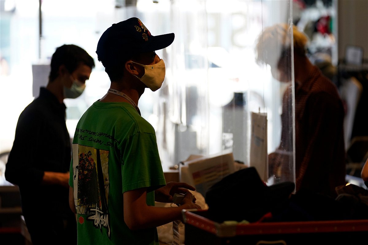 <i>Marcio Jose Sanchez/AP</i><br/>Stores are re-evaluating their mask policies after the US Centers for Disease Control and Prevention updated guidance July 27 to recommend that fully vaccinated people wear masks indoors in areas with high transmission of Covid-19