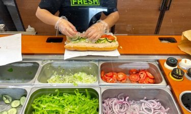 A worker at a Subway sandwich shop makes a tuna sandwich on June 22 in San Anselmo