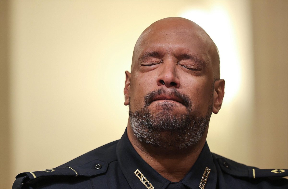 <i>Chip Somodevilla/Getty Images</i><br/>U.S. Capitol Police officer Harry Dunn becomes emotional as he testifies before the House Select Committee investigating the January 6 attack on the U.S. Capitol.