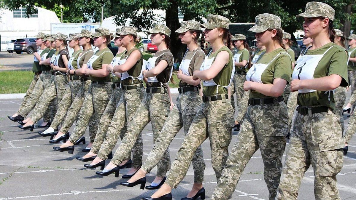 <i>Ukrainian Defence Ministry Press/AFP/Getty Images</i><br/>A handout photograph taken and released by the Ukrainian Defence ministry press-service on July 2 shows the Ukrainian female soldiers wearing heels while taking part in the the military parade rehearsal in Kiev.