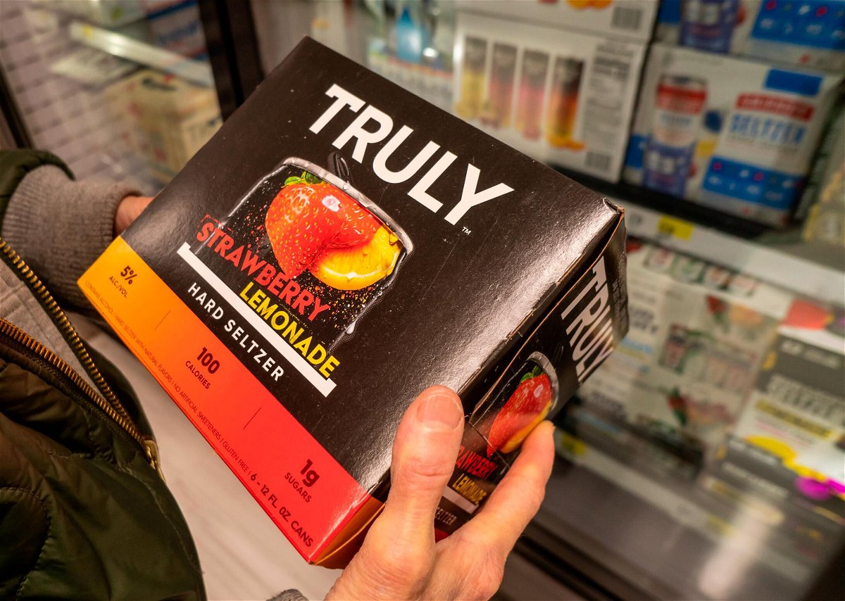 <i>Richard B. Levine/Sipa USA/Reuters</i><br/>A customer chooses Boston Beer Co.'s Truly Hard Seltzer in a supermarket in New York in April 23.