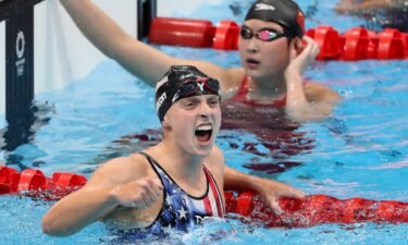 Katie Ledecky celebrates anchoring the United States to a silver medal in the women's 4x200m freestyle relay