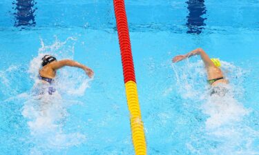 Katie Ledecky and Ariarne Titmus swim side by side