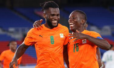 Two players from Cote d'Ivoire celebrate