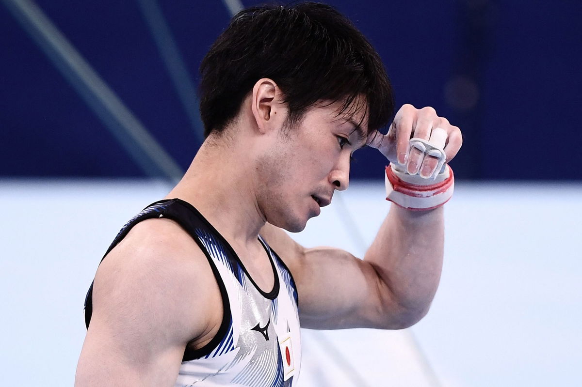 Japan's Kohei Uchimura falls off high bar in qualification 