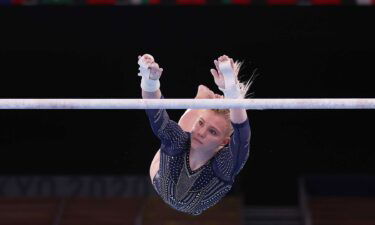 Jade Carey solid on uneven bars in all-around final