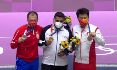 Medal ceremony for the men's 10 meter air pistol