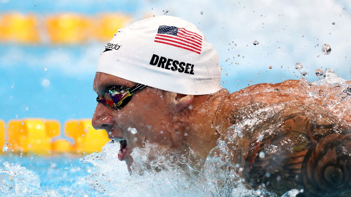 Caeleb Dressel ties 100m butterfly Olympic record in prelims