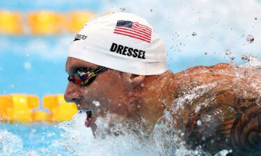 Caeleb Dressel ties 100m butterfly Olympic record in prelims