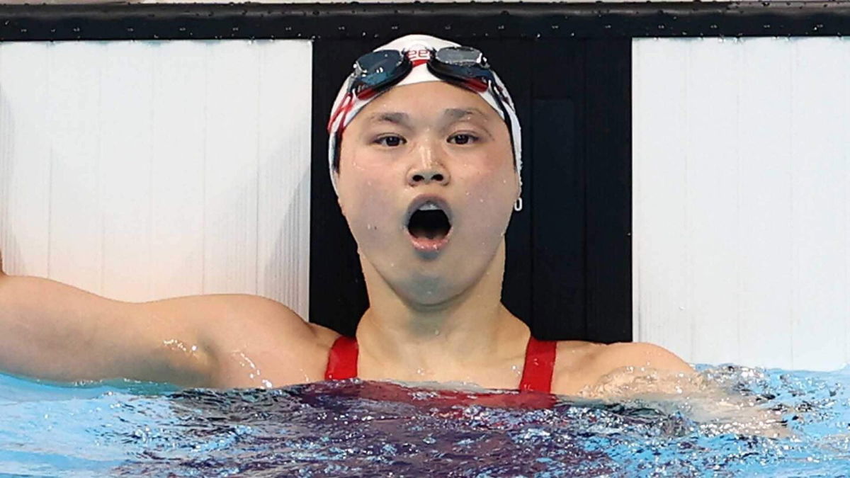 Canada's Maggie MacNeil wins gold in 100m butterfly