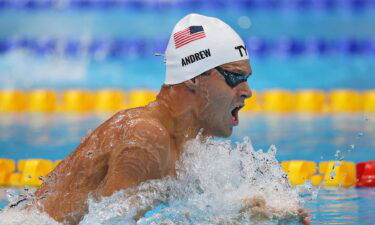 Michael Andrew wins 200m IM heat in 1:56.40.