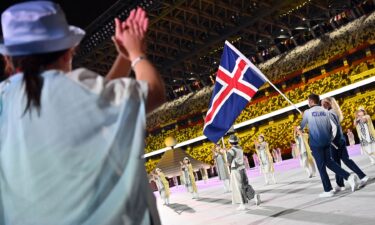 Iceland enters Olympic Stadium third in the Parade of Nations