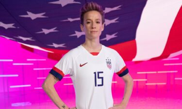 Megan Rapinoe in front of the american flag