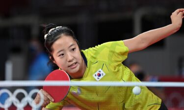 Korea's Shin in action against Luxembourg's Ni in the second round of women's singles.