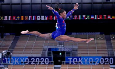 Simone Biles in the air during Olympic competition