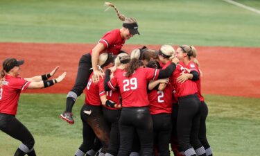 Team Canada celebrate after defeating Team Mexico 3-2 in the women's bronze medal softball game between Team Mexico and Team Canada on day four of the Tokyo 2020 Olympic Games