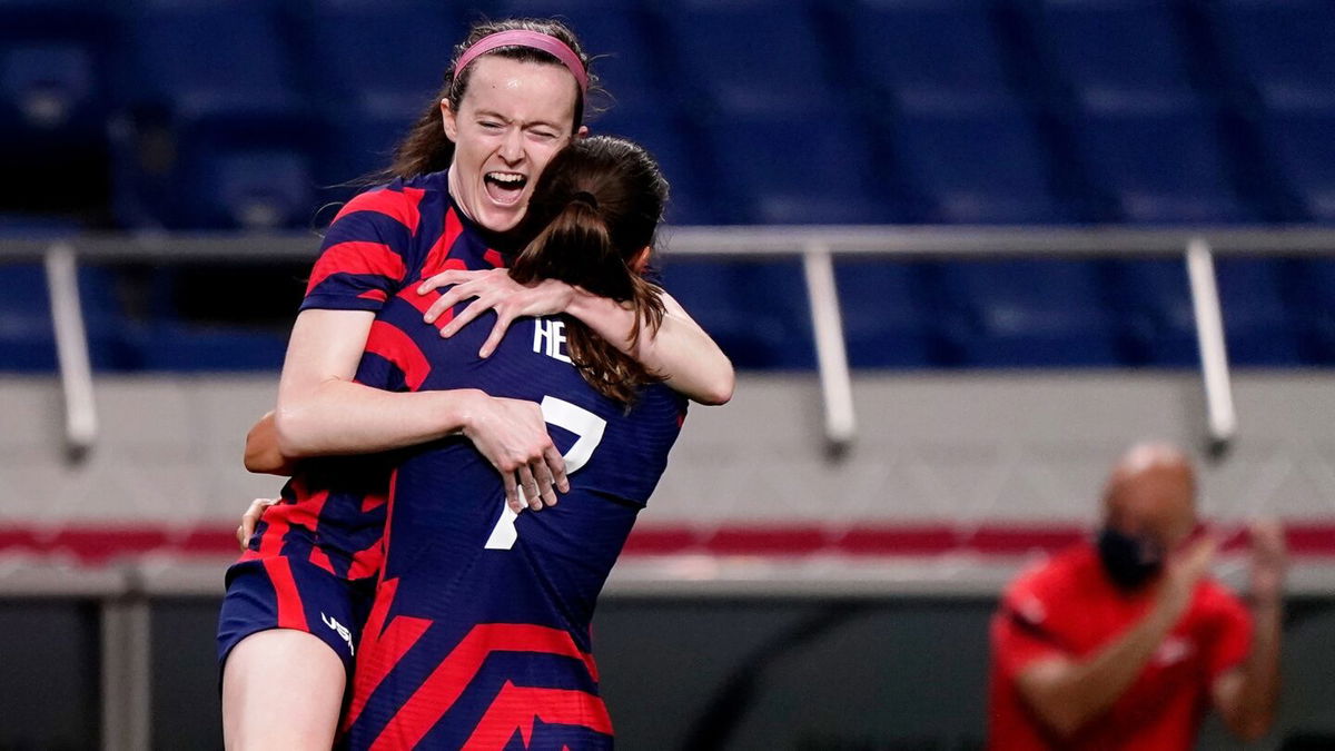 Rose Lavelle celebrates scoring the opening goal for the USWNT against New Zealand with teammate Tobin Heath.