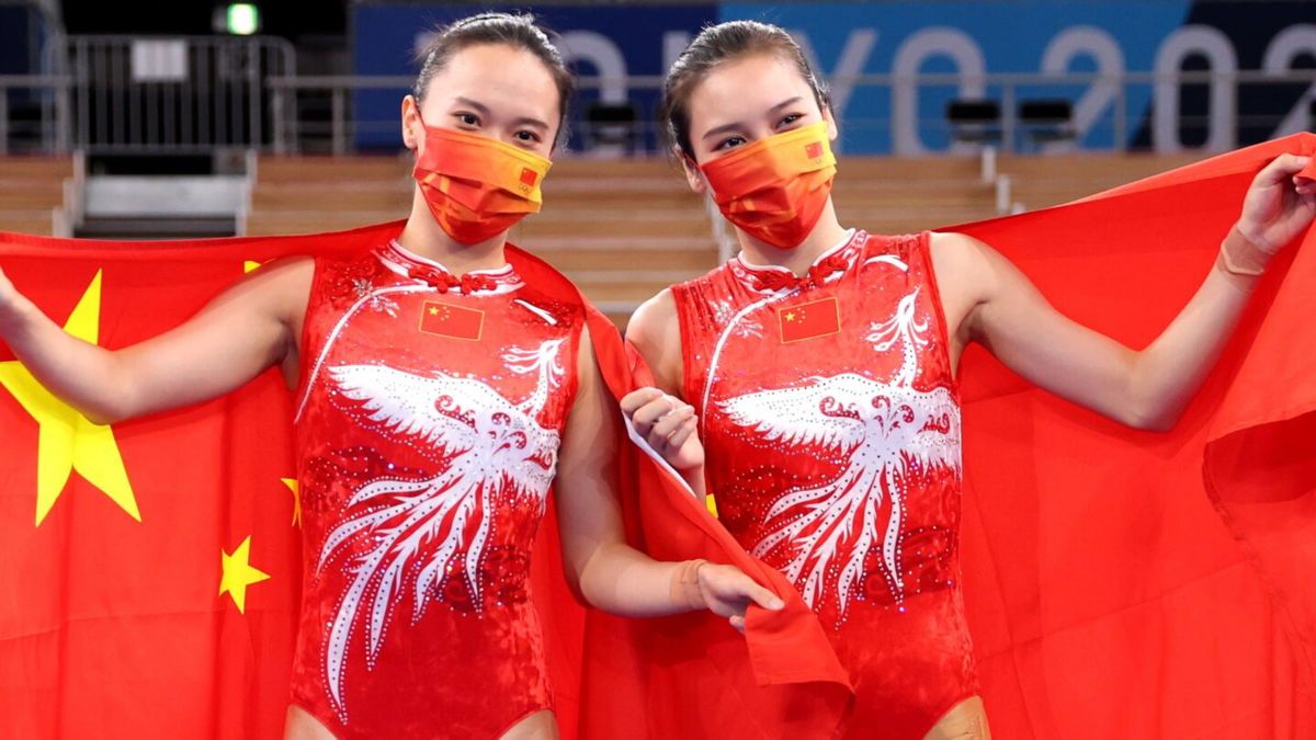 Lingling Liu and Xueying Zhu of Team China pose after winning the silver and gold medals