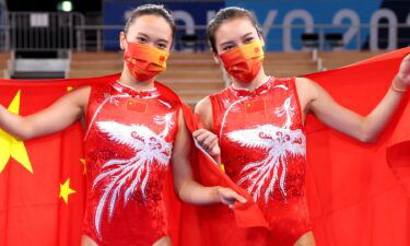Lingling Liu and Xueying Zhu of Team China pose after winning the silver and gold medals