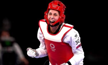 USA's Anastasija Zolotic celebrates victory against Turkey's Hatice Kubra Ilgun during the Women's 57kg Quarterfinal match at Makuharu Messe Hall A on the second day of the Tokyo 2020 Olympic Games in Japan.