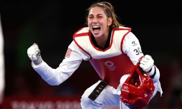 Anastasija Zolotic of Team United States celebrates after defeating Tatiana Minina of Team ROC during the Women's -57kg Taekwondo Gold Medal contest on day two of the Tokyo 2020 Olympics