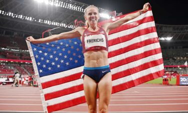 Courtney Frerichs celebrates her silver medal victory in the women's 3000m steeplechase