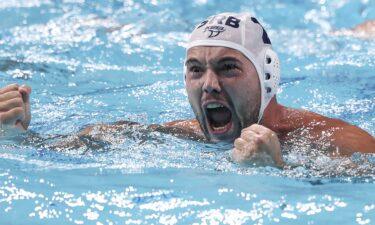 Dusan Mandic celebrates Serbia's men's water polo semifinal victory over Spain at the 2020 Tokyo Olympic Games.