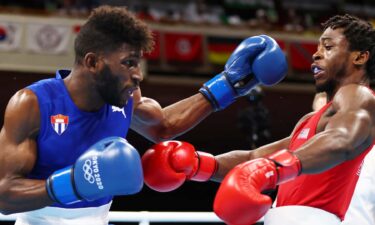 Andy Cruz of Cuba battles Keyshawn Davis of the U.S. in the lightweight gold medal match at the 2020 Tokyo Olympic Games.