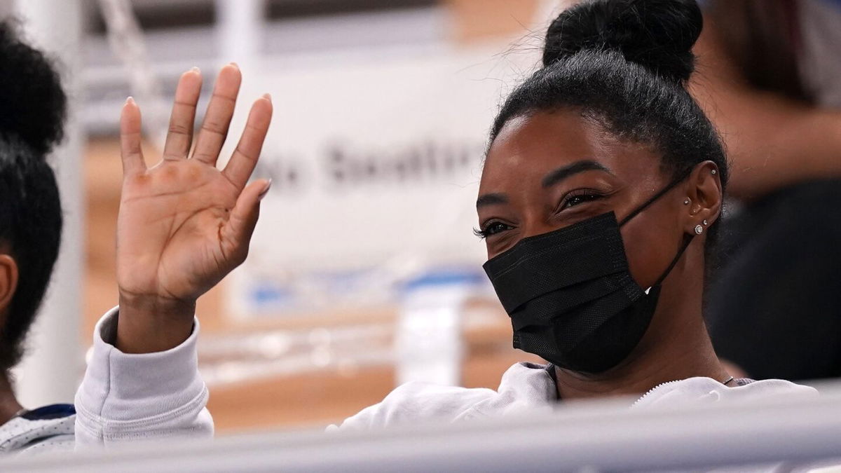 Simone Biles waves