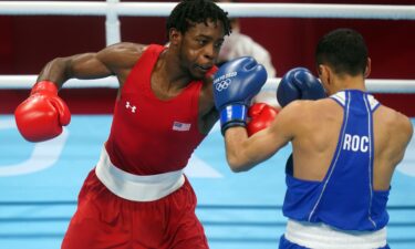 Keyshawn Davis of the USA and Gabil Mamedov of the ROC during the Men's Light (57-63kg) Quarterfinal 1 at the Kokugikan Arena.