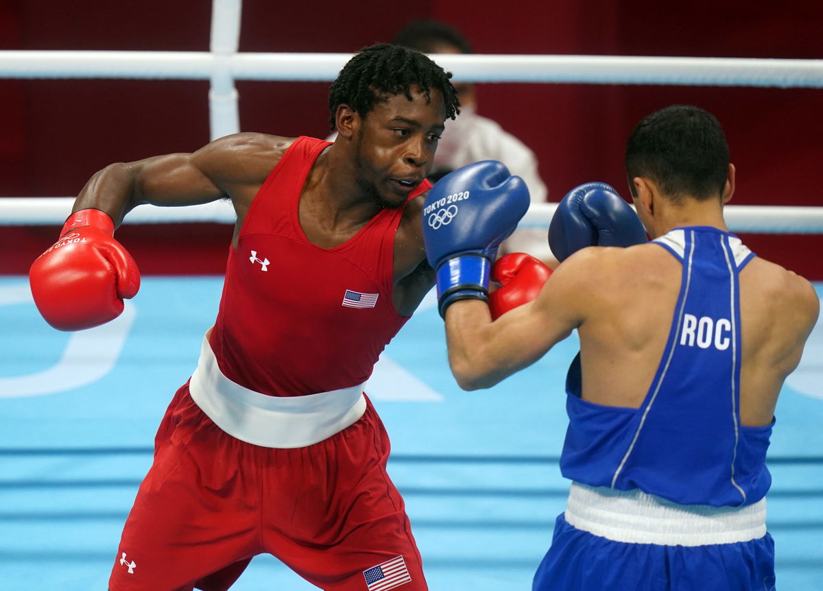 Keyshawn Davis of the USA and Gabil Mamedov of the ROC during the Men's Light (57-63kg) Quarterfinal 1 at the Kokugikan Arena.