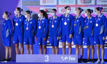 The Greece team pose with the bronze medal during the Team Free Routine medal ceremony as part of the FINA Artistic Swimming Olympic Games Qualifying Tournament 2021at Piscina Sant Jordi on June 11