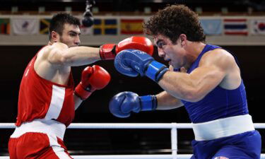 Bakhodir Jalolov defeats Richard Torrez for boxing gold