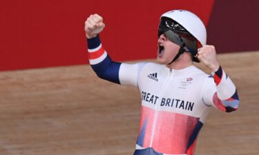 Jack Carlin gives out a cheer after winning the bronze medal