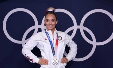 Reunited: Skinner shares silver medal win with family