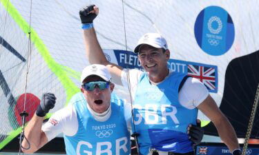 Great Britain wins first men's 49er gold