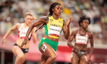 Elaine Thompson-Herah of Jamaica in action during the 200m semi finals for women during the 200m semi finals for women during the Track and Field competition at the Olympic Stadium at the Tokyo 2020 Summer Olympic Games