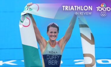 Flora Duffy celebrates earning gold in triathlon.